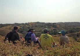 Students looking at mosaic forest landscape in Panama
